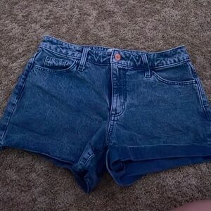 small, dark blue, worn, universal thread.